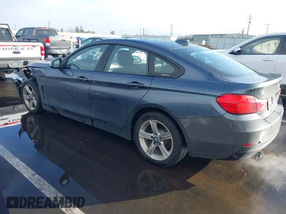 2015 BMW 4 Series 428i xDrive with VIN WBA4C9C55FD331207, listed as a IAAI auction lot 41636906 with 131,306 mi miles and . Bid and sale history available at DreamBid. Image 3.