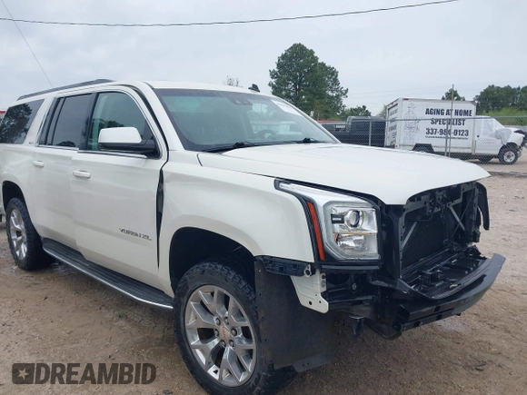 2015 GMC Yukon XL SLT with VIN 1GKS1HKC6FR178371, listed as a IAAI auction lot 41896486 with 159,282 mi miles. Bid and sale history available at carsss.com. Image 6.