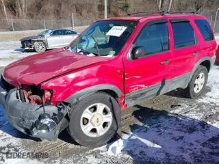2001 Ford Escape XLT with VIN 1FMYU04131KB51488, listed as a IAAI auction lot 41363166 with 327,580 mi miles. Bid and sale history available at carsss.com. Image 20.