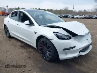 2023 Tesla Model 3 Performance z VIN 5YJ3E1EC4PF461253, wystawiony jako IAAI lot #42005223 z przebiegiem 54 976 mil mil oraz . Historia ofert i sprzedaży dostępna na DreamBid. Obrazek 1.