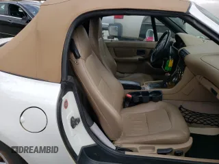 2000 BMW Z3 2.5 z VIN 4USCH9340YLG03496, wystawiony jako Copart lot #70895974 z przebiegiem 115 664 mil mil oraz Szkody całkowita. Historia ofert i sprzedaży dostępna na DreamBid. Obrazek 10.