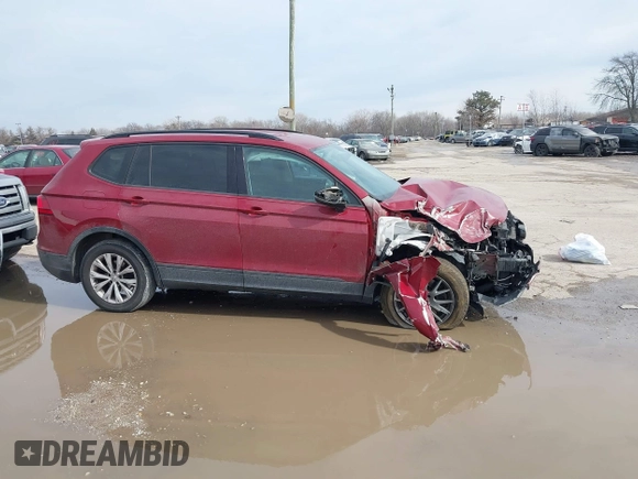 2018 Volkswagen Tiguan S with VIN 3VV1B7AX9JM085312, listed as a IAAI auction lot 41656827 with 122,322 mi miles and . Bid and sale history available at DreamBid. Image 13.