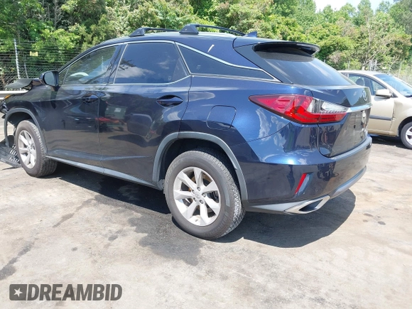 2016 Lexus RX 350 with VIN JTJBZMCA2G2001429, listed as a IAAI auction lot 42202436 with Not provided miles and . Bid and sale history available at DreamBid. Image 3.
