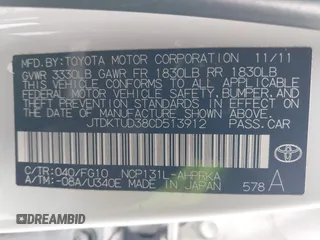 2012 Toyota Yaris L with VIN JTDKTUD38CD513912, listed as a IAAI auction lot 42131567 with 133,664 mi miles. Bid and sale history available at carsss.com. Image 9.