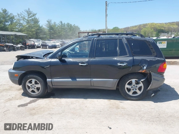 2002 Hyundai Santa Fe GLS z VIN KM8SC73D42U281993, wystawiony jako IAAI lot #42098783 z przebiegiem 256 094 mil mil oraz . Historia ofert i sprzedaży dostępna na DreamBid. Obrazek 14.