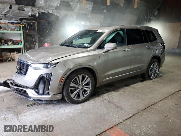 2023 Cadillac XT6 AWD Premium Luxury with VIN 1GYKPDRS7PZ193313, listed as a Copart auction lot 65376924 with 17,848 mi miles and Salvage Title. Bid and sale history available at carsss.com. Image 1.