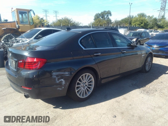 2011 BMW 5 Series 535i xDrive with VIN WBAFU7C55BC439837, listed as a IAAI auction lot 38492275 with 102,190 mi miles. Bid and sale history available at carsss.com. Image 4.