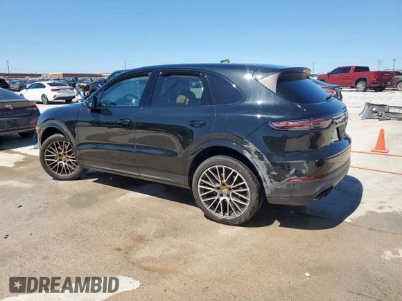 2023 Porsche Cayenne with VIN WP1AA2AY1PDA02570, listed as a Copart auction lot 57474635 with 31,407 mi miles and Salvage title. Bid and sale history available at DreamBid. Image 2.