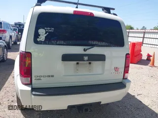 2011 Dodge Nitro Heat with VIN 1D4PT4GX9BW587284, listed as a IAAI auction lot 41998357 with 100,366 mi miles and . Bid and sale history available at DreamBid. Image 16.