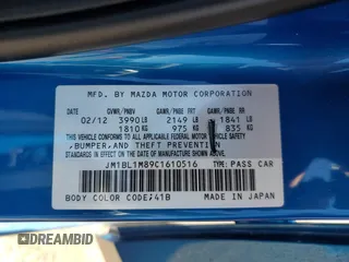 2012 Mazda 3 i Grand Touring with VIN JM1BL1M89C1610516, listed as a Copart auction lot 61794555 with 159,328 mi miles and Salvage title. Bid and sale history available at DreamBid. Image 12.