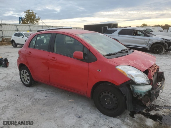 2009 Toyota Yaris with VIN JTDKT903995232885, listed as a Copart auction lot 71397904 with 112,804 mi miles and Salvage Title. Bid and sale history available at carsss.com. Image 4.