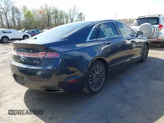 2013 Lincoln MKZ z VIN 3LN6L2G95DR808850, wystawiony jako IAAI lot #41980262 z przebiegiem Nie podano mil oraz . Historia ofert i sprzedaży dostępna na DreamBid. Obrazek 4.
