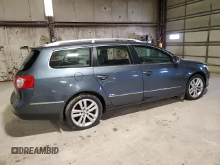 2009 Volkswagen Passat z VIN WVWXK73C39E051595, wystawiony jako Copart lot #76318454 z przebiegiem 155 892 mil mil oraz Nie do naprawy • Non repairable. Historia ofert i sprzedaży dostępna na DreamBid. Obrazek 3.