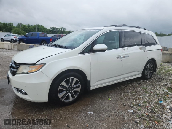 2014 Honda Odyssey Touring with VIN 5FNRL5H95EB083772, listed as a Copart auction lot 56713525 with 215,833 mi miles and Salvage title. Bid and sale history available at DreamBid. Image 1.
