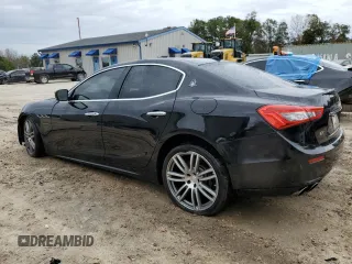 2015 Maserati Ghibli S Q4 with VIN ZAM57RTA8F1144369, listed as a Copart auction lot 77810033 with 82,749 mi miles. Bid and sale history available at carsss.com. Image 2.