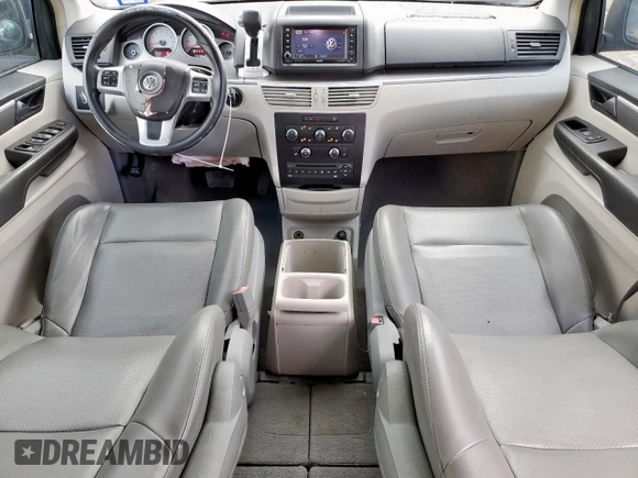 2012 Volkswagen Routan SE with VIN 2C4RVABG4CR390524, listed as a Copart auction lot 63058185 with 146,380 mi miles and Salvage title. Bid and sale history available at DreamBid. Image 8.