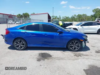 2021 Honda Civic Sport with VIN 2HGFC2F80MH527517, listed as a IAAI auction lot 42020871 with 36,058 mi miles and . Bid and sale history available at DreamBid. Image 14.