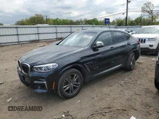 2020 BMW X4 M40i with VIN 5UX2V5C06LLE69603, listed as a Copart auction lot 49705043 with 31,939 mi miles. Bid and sale history available at carsss.com. Image 1.