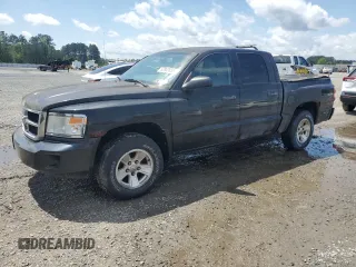 2008 Dodge Dakota SLT z VIN 1D7HW48NX8S626721, wystawiony jako Copart lot #52862855 z przebiegiem 159 605 mil mil oraz Czysty tytuł • Clean title. Historia ofert i sprzedaży dostępna na DreamBid. Obrazek 1.