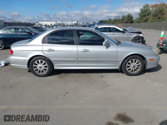 2003 Hyundai Sonata GLS with VIN KMHWF35H93A897855, listed as a IAAI auction lot 41527610 with 122,010 mi miles. Bid and sale history available at carsss.com. Image 13.