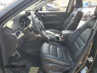 2024 Mazda CX-5 S Carbon Edition z VIN JM3KFBCL8R0489292, wystawiony jako Copart lot #55098625 z przebiegiem 11 132 mil mil oraz Szkoda całkowita • Salvage title. Historia ofert i sprzedaży dostępna na DreamBid. Obrazek 7.