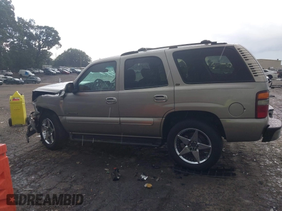 2002 Chevrolet Tahoe LT with VIN 1GNEC13Z62J233110, listed as a IAAI auction lot 42460607 with 329,196 mi miles and . Bid and sale history available at DreamBid. Image 14.