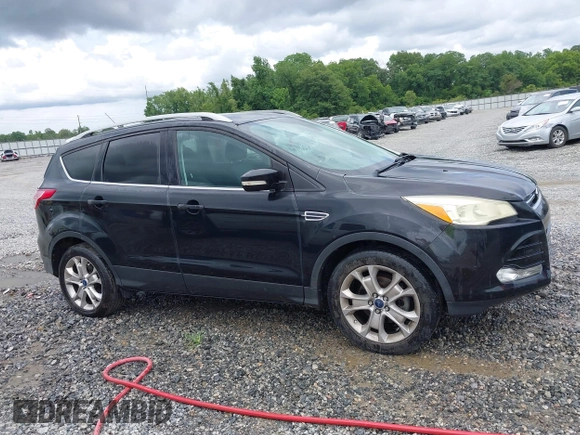 2015 Ford Escape Titanium с VIN 1FMCU0JXXFUB10676, выставлен на аукционе IAAI как лот 42412073 с пробегом 129 737 миль миль и . История ставок и продаж доступна на DreamBid. Изображение 13.