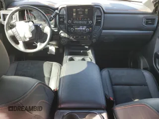 2021 Nissan Titan Pro-4X с VIN 1N6AA1ED1MN510768, выставлен на аукционе Copart как лот 77556484 с пробегом 57 540 миль миль и Списание • Salvage title. История ставок и продаж доступна на DreamBid. Изображение 8.
