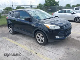 2014 Ford Escape SE z VIN 1FMCU9GX5EUC64187, wystawiony jako IAAI lot #42468943 z przebiegiem 134 209 mil mil oraz . Historia ofert i sprzedaży dostępna na DreamBid. Obrazek 1.