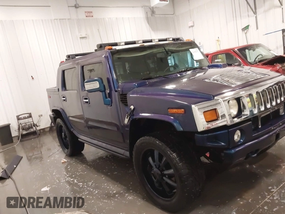 2006 Hummer H2 z VIN 5GRGN22U06H103603, wystawiony jako IAAI lot #41992767 z przebiegiem 165 782 mil mil oraz . Historia ofert i sprzedaży dostępna na DreamBid. Obrazek 14.