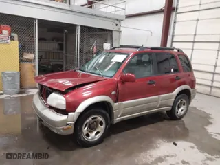 2002 Suzuki Grand Vitara JLX with VIN JS3TD62VX24155102, listed as a IAAI auction lot 41603245 with 152,657 mi miles. Bid and sale history available at carsss.com. Image 2.
