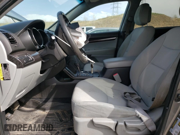 2013 Kia Sorento LX with VIN 5XYKTDA21DG401970, listed as a Copart auction lot 54079365 with 217,969 mi miles and Salvage title. Bid and sale history available at DreamBid. Image 7.