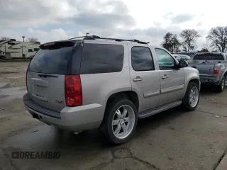 2007 GMC Yukon SLT with VIN 1GKFK130X7R106388, listed as a Copart auction lot 86125434 with 144,528 mi miles and Salvage Title. Bid and sale history available at carsss.com. Image 3.