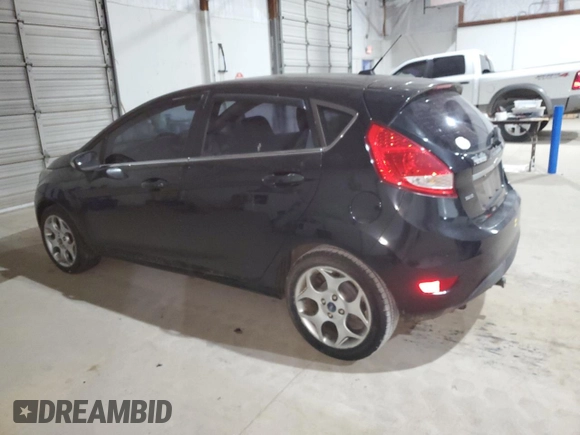 2011 Ford Fiesta SES with VIN 3FADP4FJ5BM167108, listed as a Copart auction lot 48871835 with 83,601 mi miles and Clean Title. Bid and sale history available at DreamBid. Image 2.
