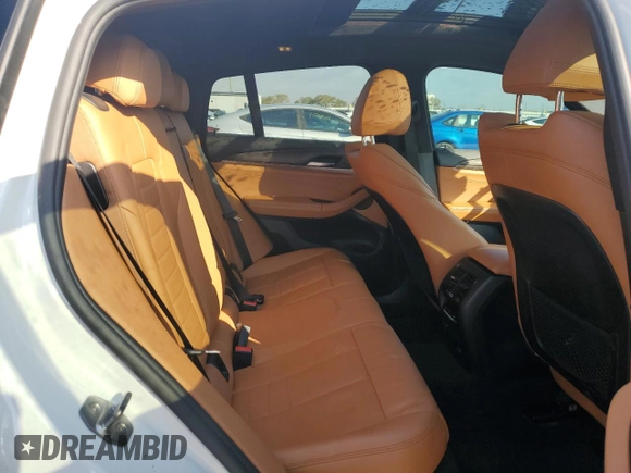 2019 BMW X4 xDrive30i with VIN 5UXUJ3C5XKLG54286, listed as a Copart auction lot 77333284 with 99,771 mi miles and Salvage Title. Bid and sale history available at carsss.com. Image 11.