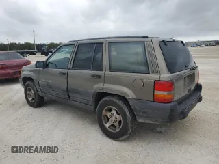 1998 Jeep Grand Cherokee Laredo with VIN 1J4GZ58S6WC137968, listed as a Copart auction lot 84083454 with 0 mi miles and Non Repairable. Bid and sale history available at carsss.com. Image 2.