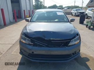 2015 Volkswagen Jetta SE with VIN 3VWD07AJ2FM310154, listed as a IAAI auction lot 42456136 with 96,979 mi miles and . Bid and sale history available at DreamBid. Image 12.