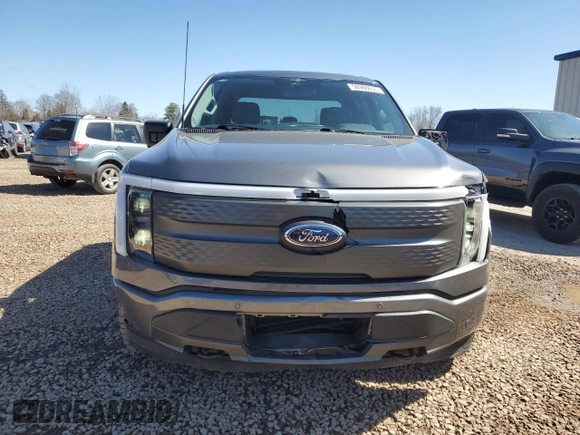 2023 Ford F-150 Lightning Pro z VIN 1FTVW1EL8PWG10894, wystawiony jako Copart lot #50988655 z przebiegiem 34 020 mil mil oraz Szkody całkowita. Historia ofert i sprzedaży dostępna na DreamBid. Obrazek 5.