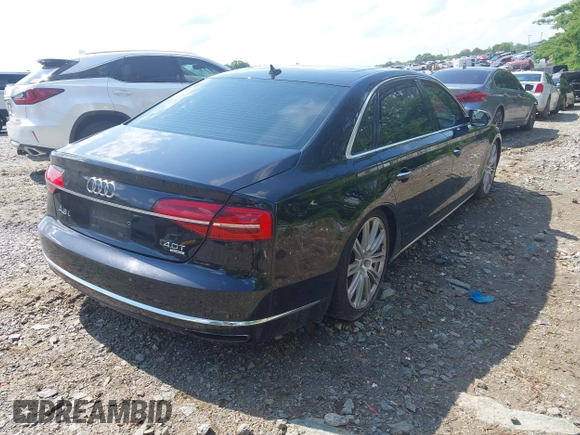 2015 Audi A8 4.0T with VIN WAU32AFD3FN039603, listed as a IAAI auction lot 42267467 with 120,393 mi miles and . Bid and sale history available at DreamBid. Image 4.