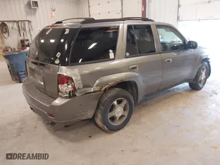 2008 Chevrolet TrailBlazer LT w/3LT with VIN 1GNDS13S182224559, listed as a IAAI auction lot 41990399 with 262,049 mi miles. Bid and sale history available at carsss.com. Image 4.