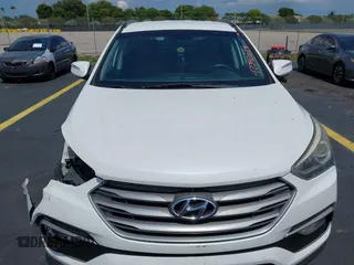 2017 Hyundai Santa Fe 2.4L z VIN 5NMZU3LB9HH034850, wystawiony jako IAAI lot #42342054 z przebiegiem 192 154 mil mil oraz . Historia ofert i sprzedaży dostępna na DreamBid. Obrazek 13.