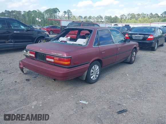 1991 Toyota Camry DLX z VIN 4T1SV21E0MU347371, wystawiony jako IAAI lot #42048695 z przebiegiem 209 451 mil mil oraz . Historia ofert i sprzedaży dostępna na DreamBid. Obrazek 4.