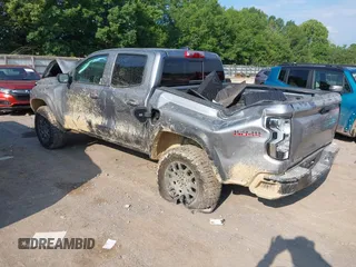 2024 Chevrolet Colorado 4WD Trail Boss with VIN 1GCPTEEK8R1307923, listed as a IAAI auction lot 42423905 with 4,190 mi miles and . Bid and sale history available at DreamBid. Image 3.