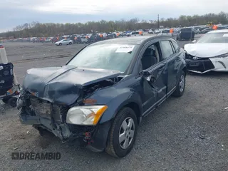 2007 Dodge Caliber with VIN 1B3HB28B17D350160, listed as a IAAI auction lot 41988479 with 174,949 mi miles. Bid and sale history available at carsss.com. Image 18.