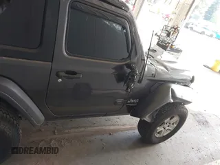 2020 Jeep Wrangler Willys z VIN 1C4GJXAG4LW237057, wystawiony jako IAAI lot #42044223 z przebiegiem 54 802 mil mil oraz . Historia ofert i sprzedaży dostępna na DreamBid. Obrazek 14.