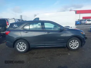 2019 Chevrolet Equinox LS z VIN 2GNAXHEV9K6146286, wystawiony jako IAAI lot #42101137 z przebiegiem 85 098 mil mil oraz . Historia ofert i sprzedaży dostępna na DreamBid. Obrazek 13.