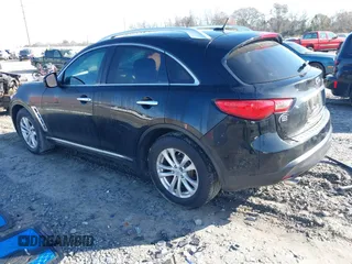 2014 Infiniti QX70 with VIN JN8CS1MU2EM451932, listed as a IAAI auction lot 41439834 with 125,781 mi miles and . Bid and sale history available at DreamBid. Image 3.
