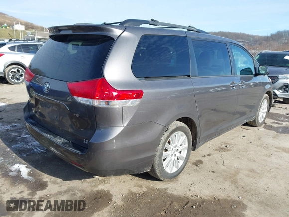 2013 Toyota Sienna LE with VIN 5TDJK3DC8DS056730, listed as a IAAI auction lot 41141247 with 166,579 mi miles and . Bid and sale history available at DreamBid. Image 4.