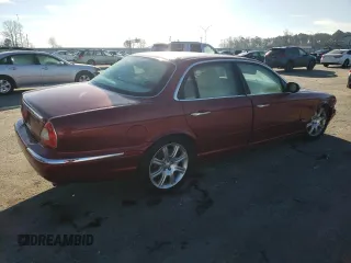 2004 Jaguar XJ VDP with VIN SAJWA74C14SG25722, listed as a Copart auction lot 84757994 with 62,152 mi miles and Salvage Title. Bid and sale history available at carsss.com. Image 3.