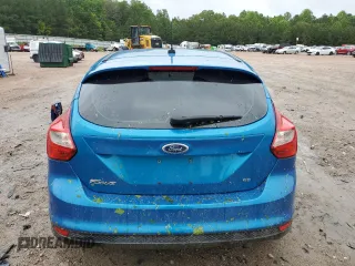 2012 Ford Focus SE z VIN 1FAHP3K22CL413920, wystawiony jako Copart lot #57769615 z przebiegiem 200 728 mil mil oraz Szkoda całkowita • Salvage title. Historia ofert i sprzedaży dostępna na DreamBid. Obrazek 6.